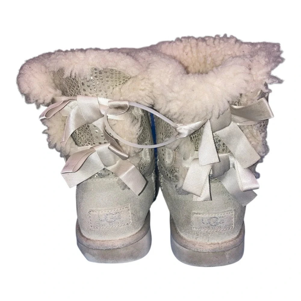 UGG Bailey Bow Bling boots in a light color boots are adorned with silky bows
